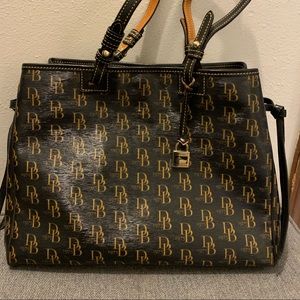 Dooney and Bourke bag, IT Shiny with tassel detail. Red interior. Flawless!